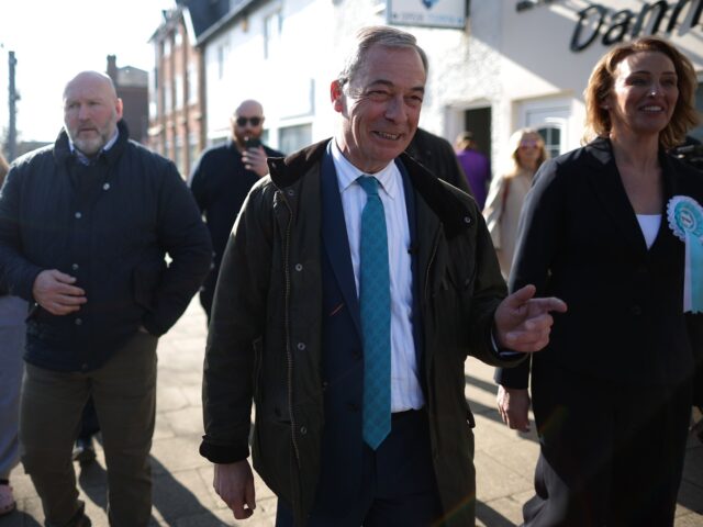 FRODSHAM, ENGLAND - MARCH 24: Reform UK leader, Nigel Farage and candidate Sarah Pochin (R