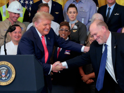 WASHINGTON, DC - JUNE 26: U.S. President Donald Trump shakes hands with his Border Czar To