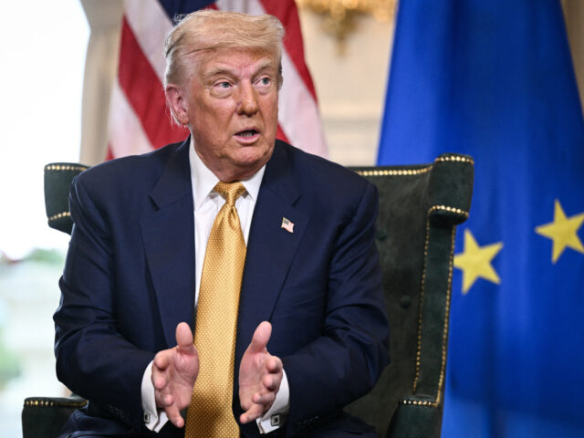 US President Donald Trump reacts as he speaks with European Commission President Ursula vo