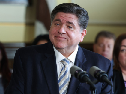 Gov. JB Pritzker takes questions at the Illinois Capitol during the legislative session, O