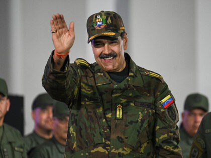 Venezuela's President Nicolas Maduro greets during a military ceremony in Fuerte Tiun