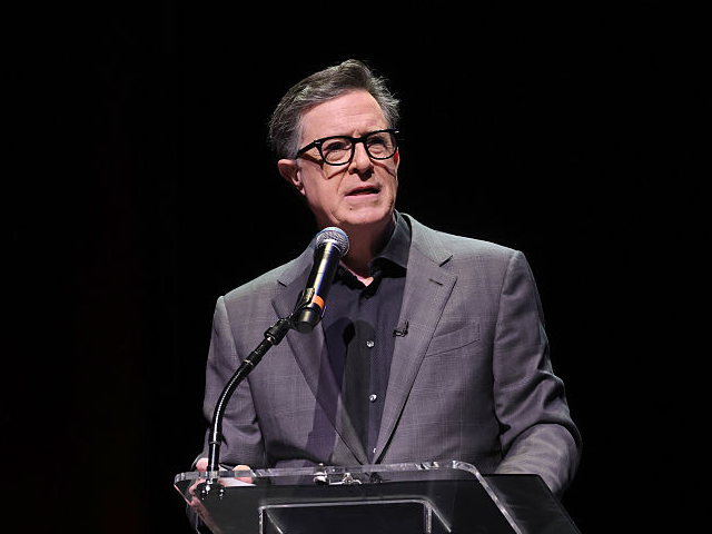 GettyImages-2250634619 NEWARK, NEW JERSEY - DECEMBER 07: Stephen Colbert greets the audience before a conversatio