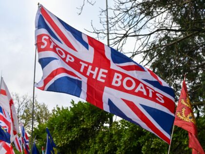 CROWBOROUGH, ENGLAND - DECEMBER 14: Crowds march through Crowborough during the peaceful p