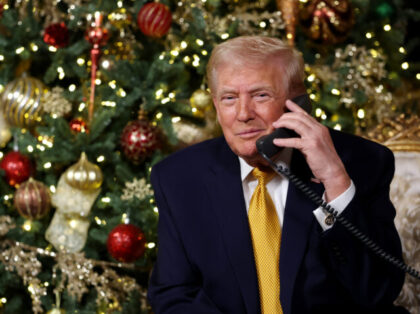 PALM BEACH, FLORIDA - DECEMBER 24: U.S. President Donald Trump calls children as he partic