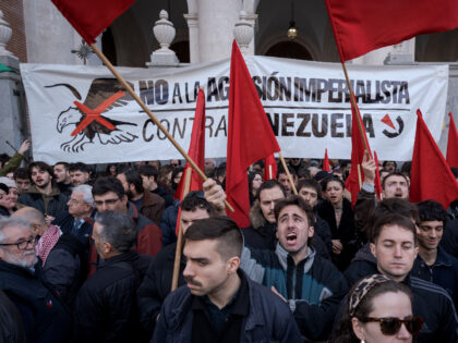 MADRID, SPAIN - JANUARY 04: People gather outside the United States Embassy to stage a pro