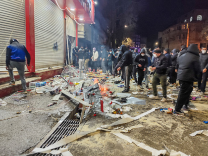 Iranians gather while blocking a street during a protest in Kermanshah, Iran on January 8,