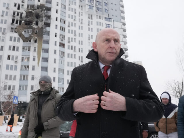 Defence Secretary John Healey views damage caused by a Russian missile strike on a residen