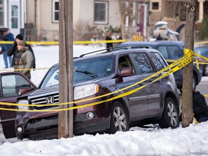 MINNEAPOLIS, MN. - JANUARY 2026: A single bullet hole can be seen on the driver's side of