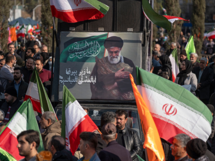 Iranian protesters participate in a pro-Government rally in Tehran, Iran, on January 12, 2