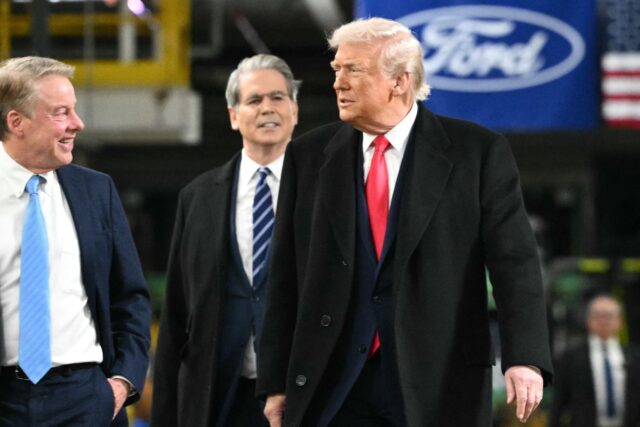 US President Donald Trump speaks with Ford executive chairman Bill Ford (L) and Treasury S