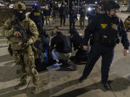 MINNEAPOLIS, MINNESOTA, U.S. â" JANUARY 15: Federal immigration officers arrest a protest