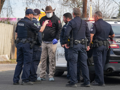 Three Texas Officers Injured When Homicide Suspect Opens Fire