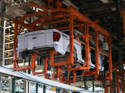 DEARBORN, MICHIGAN - JANUARY 13: The body of a Ford F-150 truck moves along the assembly l