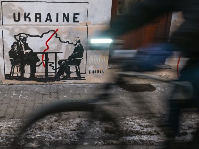 KRAKOW, POLAND JANUARY 22:A mural titled 'Divided by Oligarchy' by anonymous Norwegian str