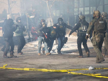 GettyImages-2257423056 MINNEAPOLIS, UNITED STATES - JANUARY 24: Federal agents fire tear gas during a demonstrati