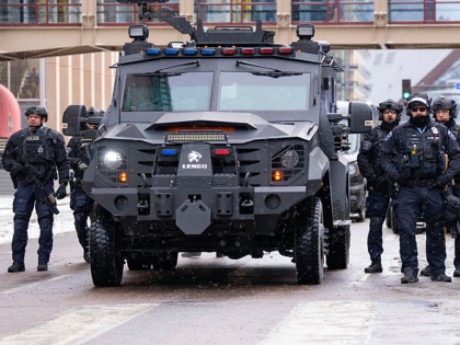 MINNEAPOLIS, MN. - JANUARY 2026: Minneapolis Police officers wearing riot gear clear the s