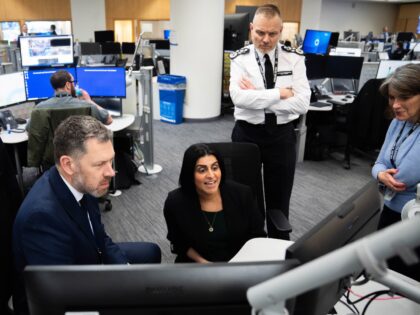 EDITORS NOTE: Confidential information on screens has been pixelated by PA at the request