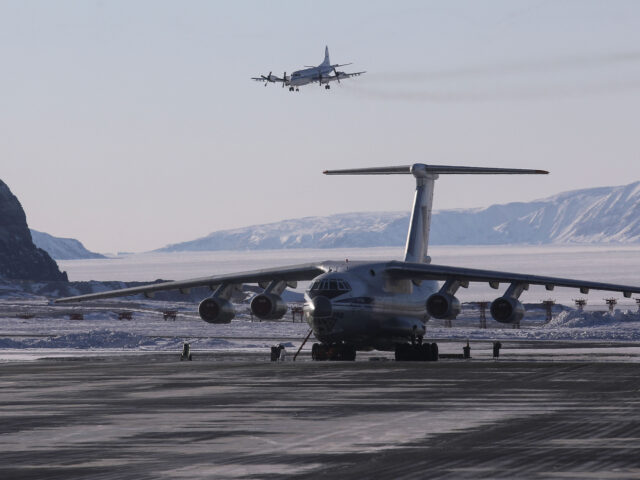 PITUFFIK, GREENLAND - MARCH 24: NASA's Operation IceBridge research aircraft (TOP) lands a