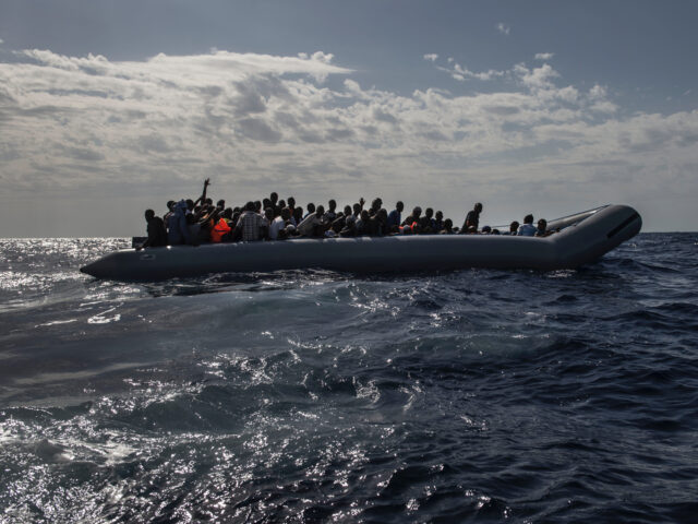 SICILY, ITALY - OCTOBER, 2014: Italian troops with the Uraniam Navy Ship rescue African mi