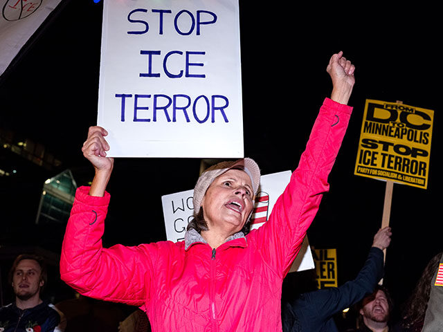 GettyImages2254703928 Demonstrators protest a fatal shooting in Minneapolis by an Immigration and Customs Enforc