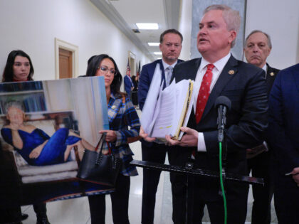 House Oversight and Government Reform Committee Chairman James Comer (R-KY) (C) shows a no