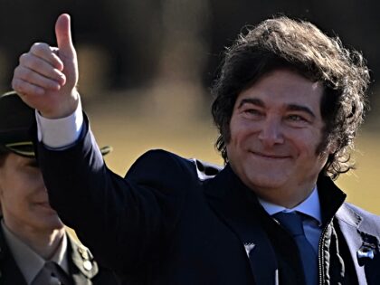 Argentina's President Javier Milei gives his thumb up on arrival to attend the Flag Day co