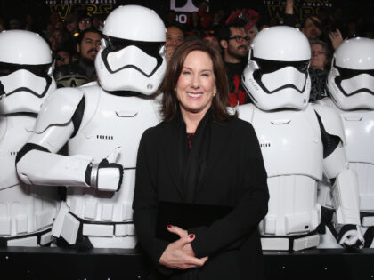 Kathleen Kennedy Lucasfilm President Kathleen Kennedy poses with Stormtroopers at the Premiere of Walt Disn