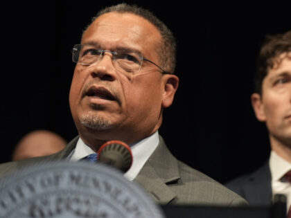 Minnesota Attorney General Keith Ellison, left, and Minneapolis Mayor Jacob Frey, right, a