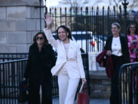 Venezuelan opposition leader Maria Corina Machado waves to supporters as she leaves the Wh