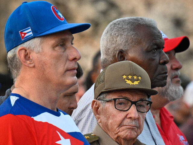 Cuban President Miguel Diaz-Canel (L) and former president Raul Castro participate in the