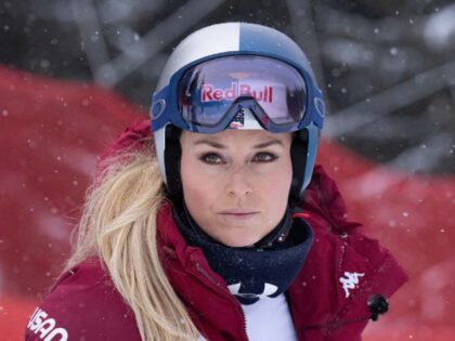 CRANS MONTANA, SWITZERLAND - JANUARY 30: Lindsey Vonn of Team United States inspects the c