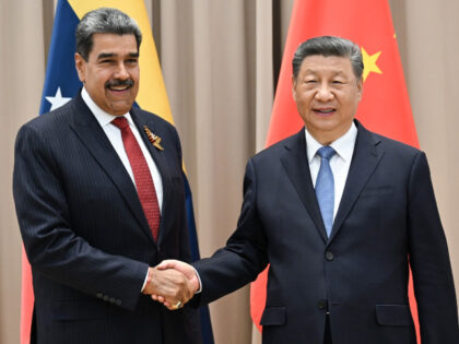 Chinese President Xi Jinping meets with Venezuelan President Nicolas Maduro on the sidelin