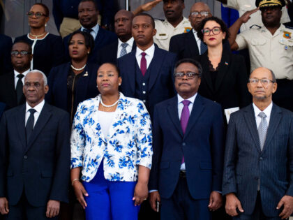 Members of the Presidential Transitional Council, (lower L-R) Edgard LeBlanc Fils, Regine