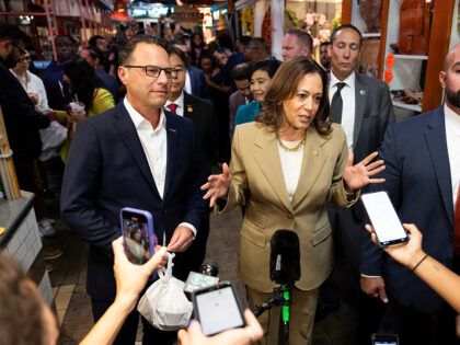 Vice President Kamala Harris and Pennsylvania Governor Josh Shapiro (L) speak to the press