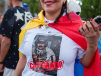 A resident wears a shirt with an image of ousted Venezuelan President Nicolas Maduro in US