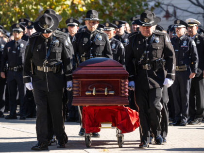 Alhambra Police Officer Alec Sanders' casket leaves his funeral service at Shepherd C