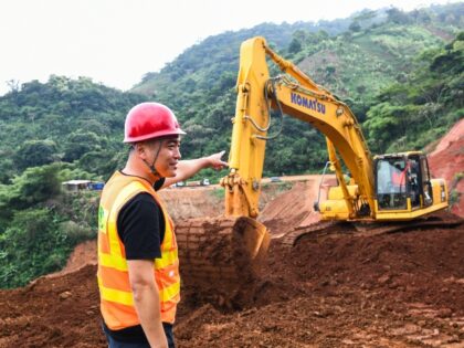 A managerial staff member of China First Highway Engineering Co., Ltd. CFHEC works at the