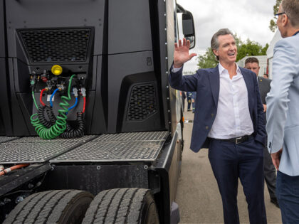 Paramount , CA - May 01: California Governor Gavin Newsom, left, talks with Michael Lohsch