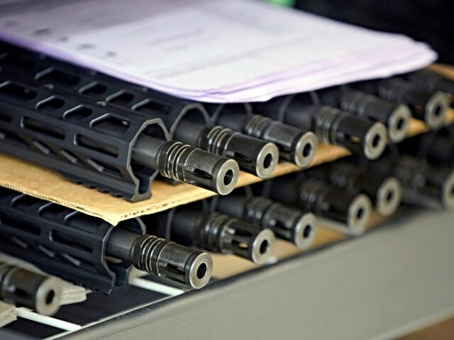gun barrel AR-15 style rifle barrels sit on a shelf waiting to be assembled at Davidson Defense in Or