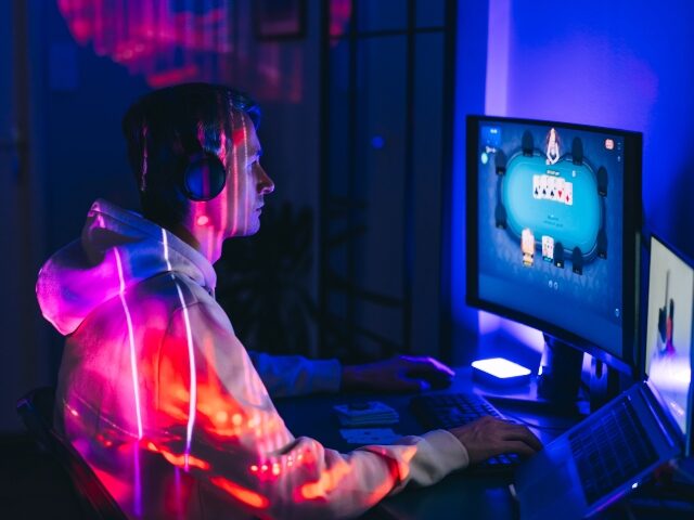 man playing online poker