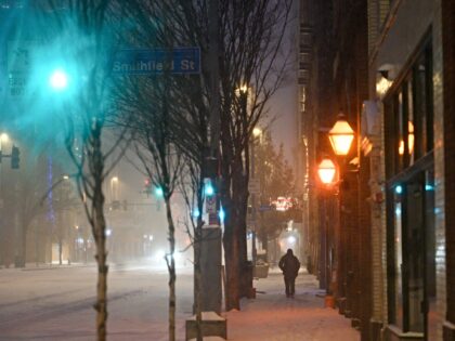 A pedestrian during a winter storm in downtown Pittsburgh, Pennsylvania, US, on Sunday, Ja