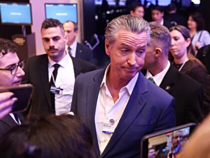 Gavin Newsom, governor of California, speaks to members of the media during the World Econ