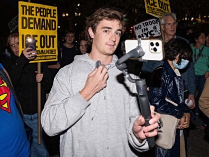 NEW YORK, NEW YORK - OCTOBER 22: Conservative influencer Nick Shirley films protestors dem