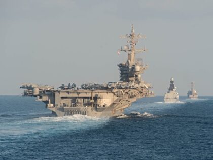 191119-N-DS741-1049 STRAIT OF HORMUZ (Nov. 19, 2019) The aircraft carrier USS Abraham Linc