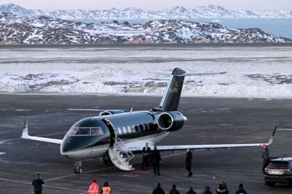 Danish Prime Minister Mette Frederiksen was greeted by Greenland's Prime Minister Jen