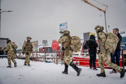 Danish soldiers disembark in Nuuk, Greenland, on January 18, 2026, as US President Donald