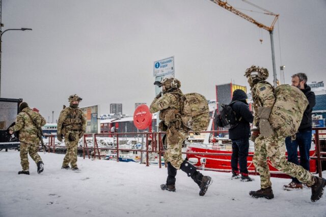 Danish soldiers disembark in Nuuk, Greenland, on January 18, 2026, as US President Donald