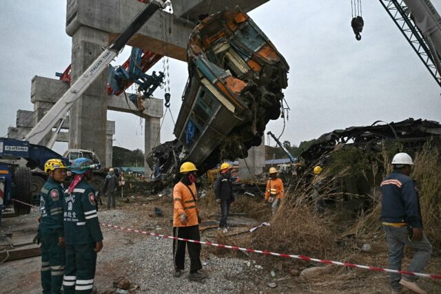 The massive crane's broken structure was left resting on giant concrete pillars, whil