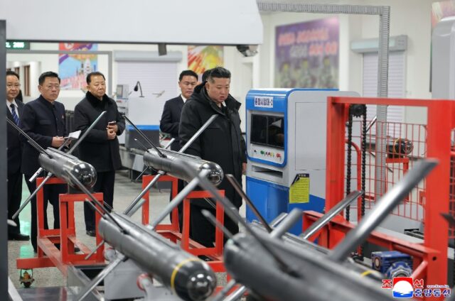 A photo released by North Korean state media shows leader Kim Jong Un visiting a missile f