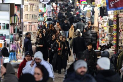 Many shops in the capital Tehran's Grand Bazaar opened again amid a heavy security pr